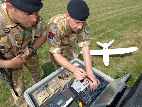 A Desert Hawk UAV with soldiers from 32 Regiment Royal Artillery at the control panel