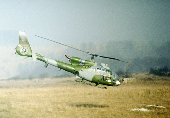 ARMY GAZELLE HELICOPTER FLYING LOW ON EXERCISE ON SALISBURY PLAIN